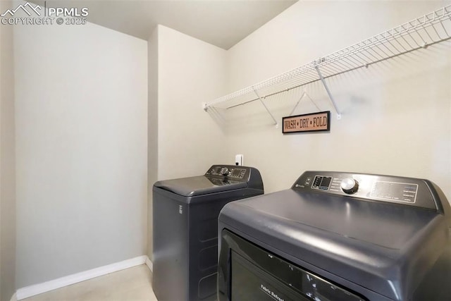 4631 Zircon Dr, Colorado Springs, CO 80938 - washroom featuring washer and clothes dryer and baseboards