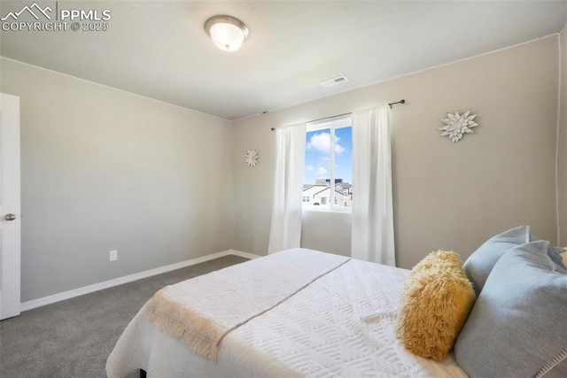 4631 Zircon Dr, Colorado Springs, CO 80938 - carpeted bedroom with baseboards