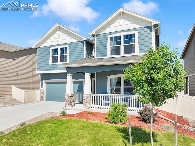4631 Zircon Dr, Colorado Springs, CO 80938 - craftsman inspired home featuring covered porch, concrete driveway, and an attached garage