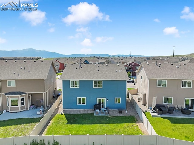 4631 Zircon Dr, Colorado Springs, CO 80938 - back of property with a residential view, a patio area, and a mountain view