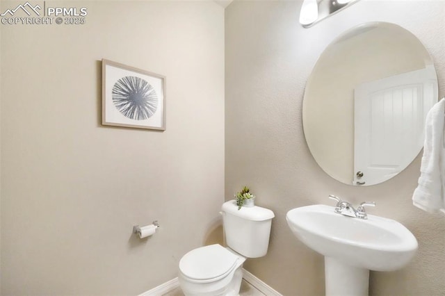 4631 Zircon Dr, Colorado Springs, CO 80938 - bathroom featuring toilet and baseboards