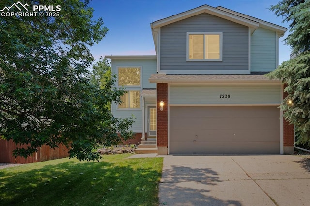7230 Julynn Rd, Colorado Springs, CO 80919 - view of front of property featuring brick siding, a garage, driveway, and entry steps