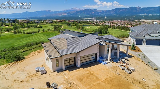 13497 Pride Mountain Dr, Colorado Springs, CO 80921 - view from above of property featuring a mountainous background and a golf course
