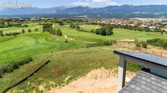 13497 Pride Mountain Dr, Colorado Springs, CO 80921 - view of mountain backdrop featuring a golf club, a nearby body of water, and nearby suburban area
