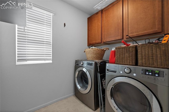 6131 Vickie Ln, Colorado Springs, CO 80923 - laundry room featuring cabinet space and washer and clothes dryer