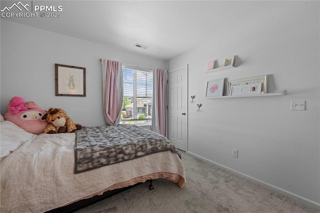 6131 Vickie Ln, Colorado Springs, CO 80923 - carpeted bedroom with baseboards