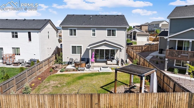 6131 Vickie Ln, Colorado Springs, CO 80923 - rear view of property featuring an outdoor hangout area, a patio, a fenced backyard, and a residential view