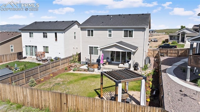 6131 Vickie Ln, Colorado Springs, CO 80923 - rear view of property featuring a patio area and a fenced backyard