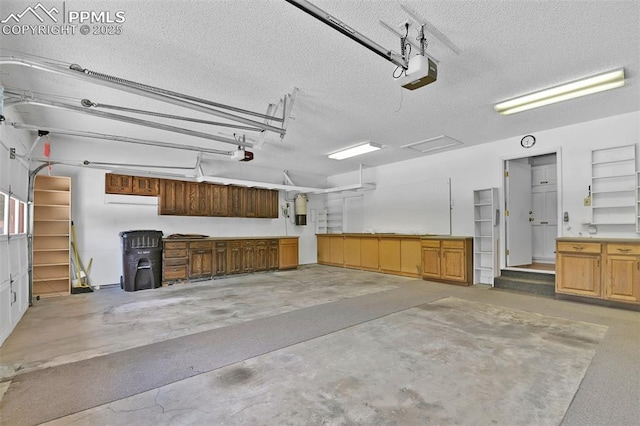 3710 Saddle Rock Rd, Colorado Springs, CO 80918 - garage featuring a garage door opener