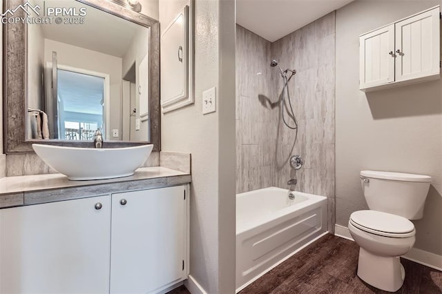 1994 Erin Loop, Colorado Springs, CO 80918 - bathroom with wood finished floors, vanity, and shower / bathtub combination