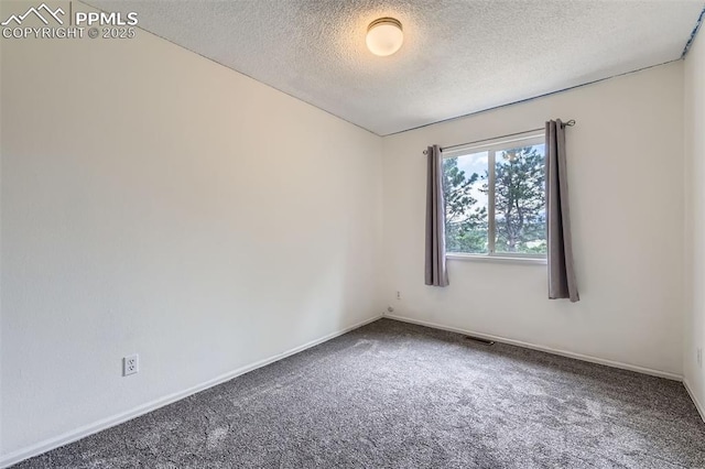 1994 Erin Loop, Colorado Springs, CO 80918 - carpeted empty room with a textured ceiling and baseboards