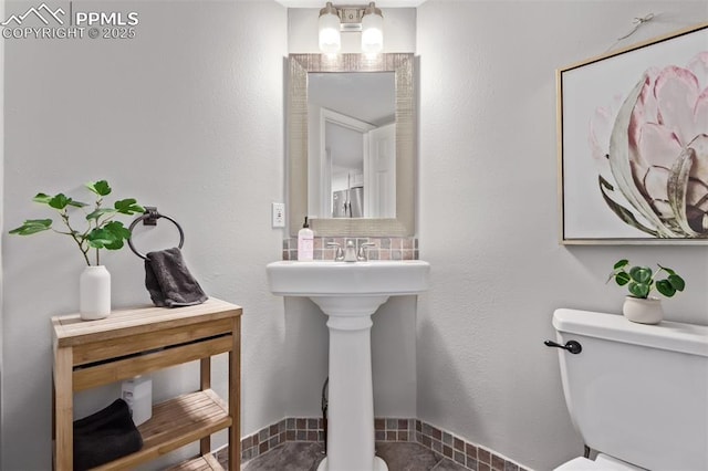 12183 W Chenango Dr, Morrison, CO 80465 - half bath with toilet and a sink