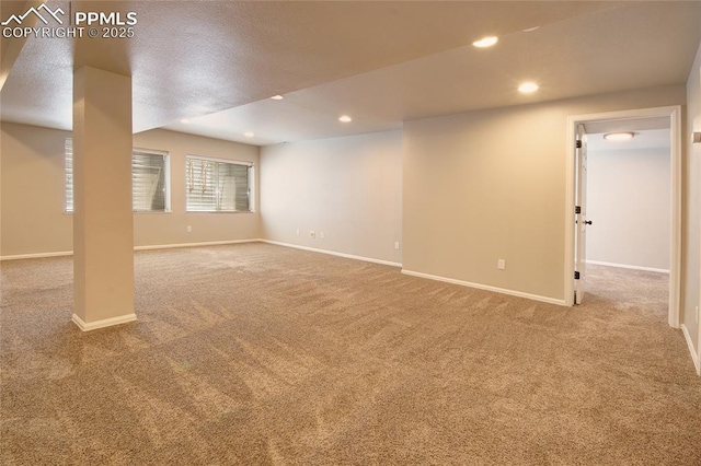 6872 Los Reyes Cir, Colorado Springs, CO 80918 - below grade area featuring carpet and recessed lighting