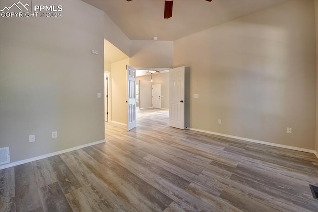 6872 Los Reyes Cir, Colorado Springs, CO 80918 - spare room with ceiling fan, wood finished floors, and high vaulted ceiling