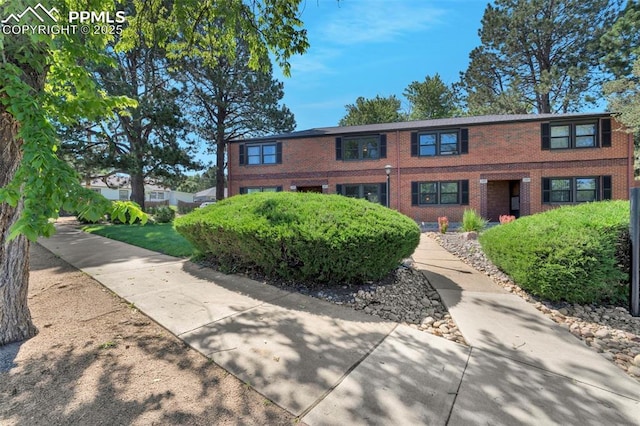 2493 Paseo Rd, Colorado Springs, CO 80907 - view of front of property featuring brick siding