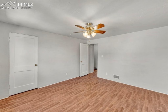 2493 Paseo Rd, Colorado Springs, CO 80907 - spare room with light wood-style floors and a ceiling fan