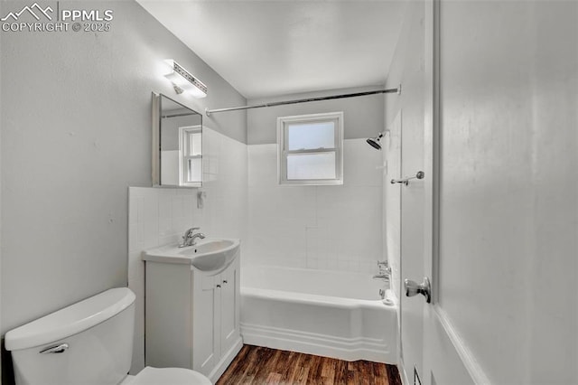 2493 Paseo Rd, Colorado Springs, CO 80907 - bathroom with vanity, bathtub / shower combination, and wood finished floors