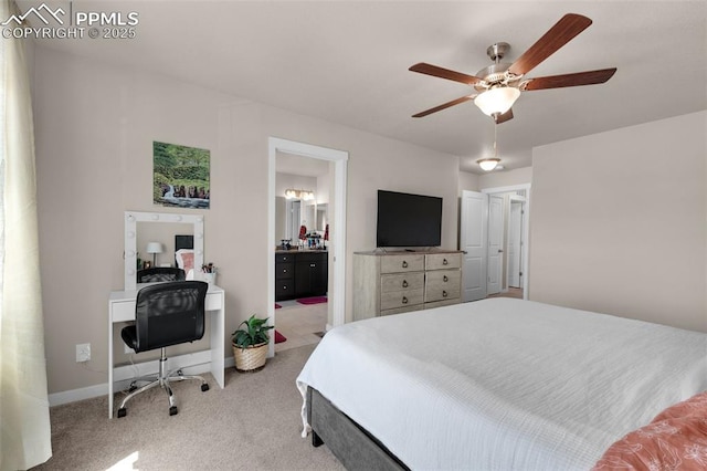 2823 Gobi Dr, Colorado Springs, CO 80939 - bedroom with light carpet, ceiling fan, ensuite bath, and a desk