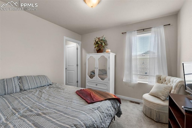2823 Gobi Dr, Colorado Springs, CO 80939 - carpeted bedroom featuring baseboards