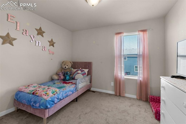2823 Gobi Dr, Colorado Springs, CO 80939 - bedroom with light colored carpet and baseboards