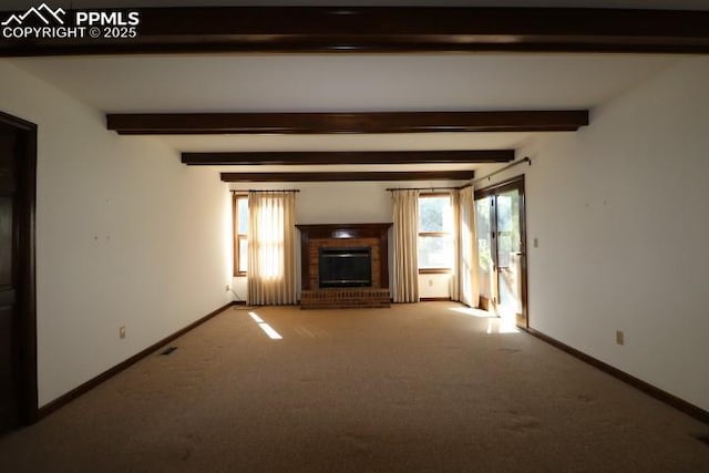 4170 Broadmoor Bluffs Dr, Colorado Springs, CO 80906 - unfurnished living room featuring beamed ceiling, carpet flooring, and a brick fireplace