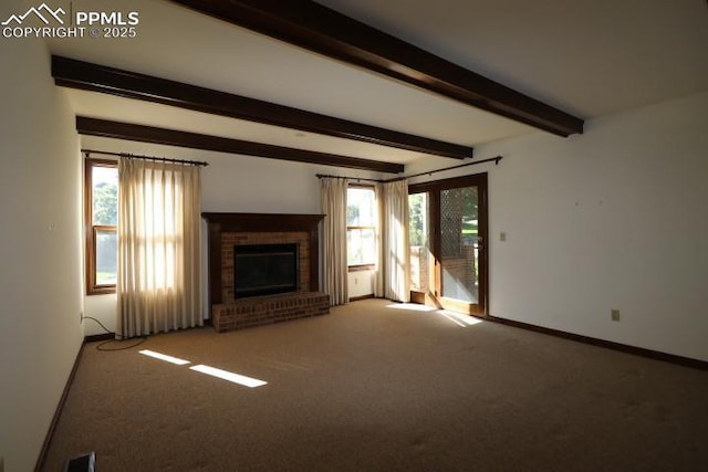 4170 Broadmoor Bluffs Dr, Colorado Springs, CO 80906 - unfurnished living room with carpet flooring, plenty of natural light, a brick fireplace, and beamed ceiling