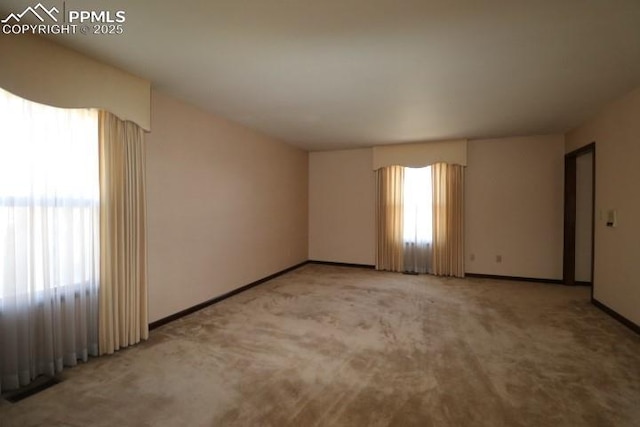 4170 Broadmoor Bluffs Dr, Colorado Springs, CO 80906 - unfurnished room featuring healthy amount of natural light and carpet
