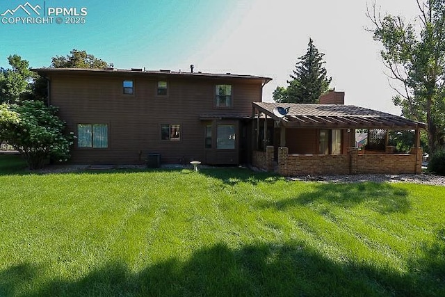 4170 Broadmoor Bluffs Dr, Colorado Springs, CO 80906 - back of property with a chimney and a yard