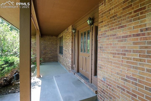 4170 Broadmoor Bluffs Dr, Colorado Springs, CO 80906 - doorway to property featuring brick siding