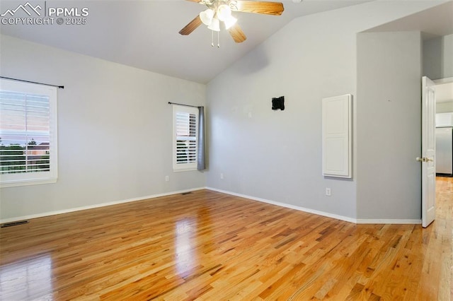 10489 Cedar Breaks Dr, Peyton, CO 80831 - empty room featuring plenty of natural light, ceiling fan, light wood-style flooring, and high vaulted ceiling
