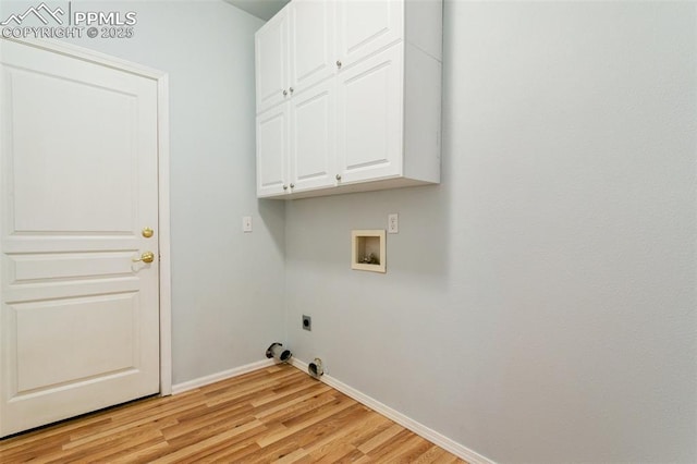 10489 Cedar Breaks Dr, Peyton, CO 80831 - laundry area with cabinet space, hookup for an electric dryer, washer hookup, light wood-style floors, and gas dryer hookup