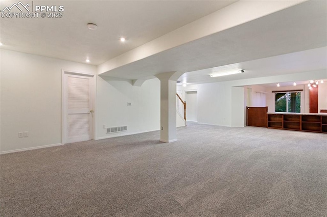 10489 Cedar Breaks Dr, Peyton, CO 80831 - finished basement featuring carpet, stairway, and recessed lighting