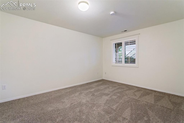 10489 Cedar Breaks Dr, Peyton, CO 80831 - empty room with carpet floors and a smoke detector