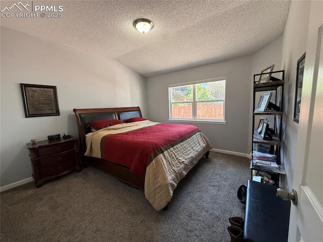 5926 Wisteria Dr, Colorado Springs, CO 80919 - carpeted bedroom featuring a textured ceiling and baseboards
