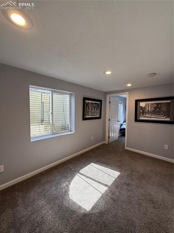 5926 Wisteria Dr, Colorado Springs, CO 80919 - unfurnished room with carpet flooring and recessed lighting