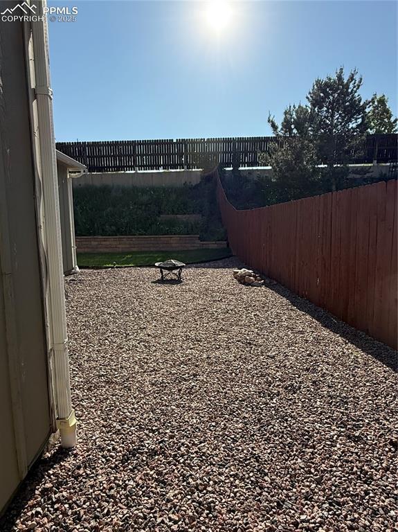 5926 Wisteria Dr, Colorado Springs, CO 80919 - view of yard
