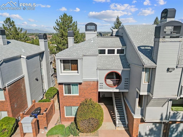 3692 Iguana Dr, Colorado Springs, CO 80910 - view of building exterior with stairs