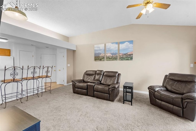 3692 Iguana Dr, Colorado Springs, CO 80910 - living area featuring carpet floors, ceiling fan, and lofted ceiling