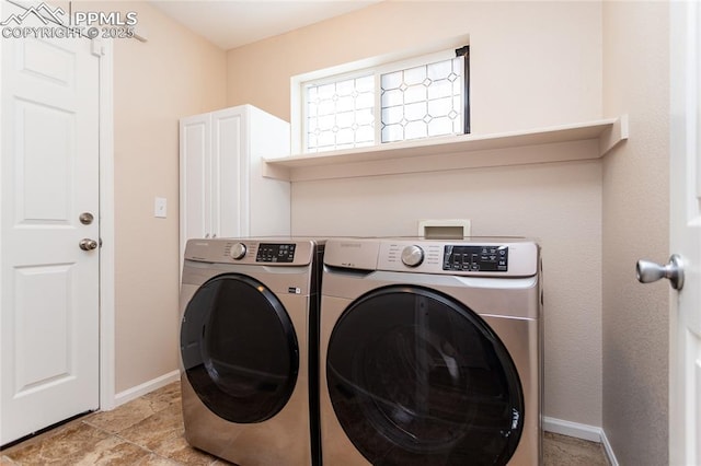 7292 Gardenstone Dr, Colorado Springs, CO 80922 - washroom featuring washer and dryer and baseboards