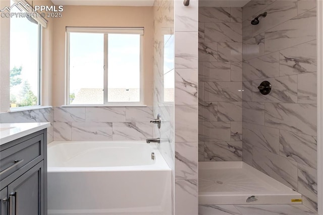 7292 Gardenstone Dr, Colorado Springs, CO 80922 - full bath featuring a garden tub, vanity, and tiled shower