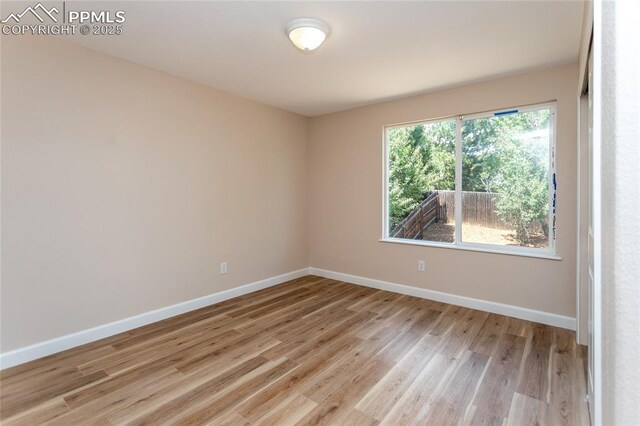 7292 Gardenstone Dr, Colorado Springs, CO 80922 - unfurnished room featuring light wood-style floors and baseboards