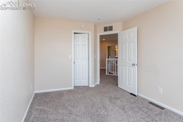 7292 Gardenstone Dr, Colorado Springs, CO 80922 - unfurnished bedroom with carpet and baseboards