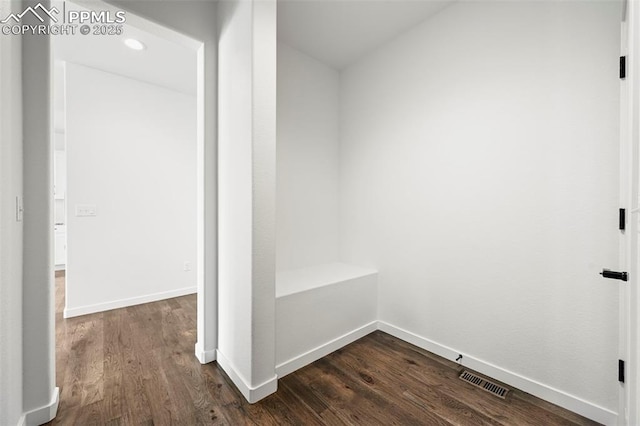 8309 Tom Ketchum Dr, Colorado Springs, CO 80908 - hallway featuring dark wood-type flooring