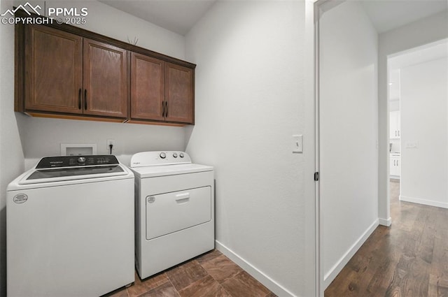8309 Tom Ketchum Dr, Colorado Springs, CO 80908 - laundry area featuring washing machine and clothes dryer and cabinet space