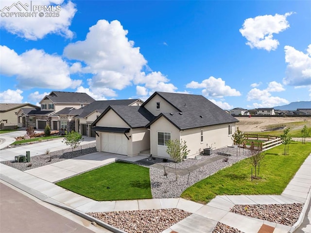 8309 Tom Ketchum Dr, Colorado Springs, CO 80908 - view of front of house with stucco siding, a residential view, concrete driveway, an attached garage, and roof with shingles