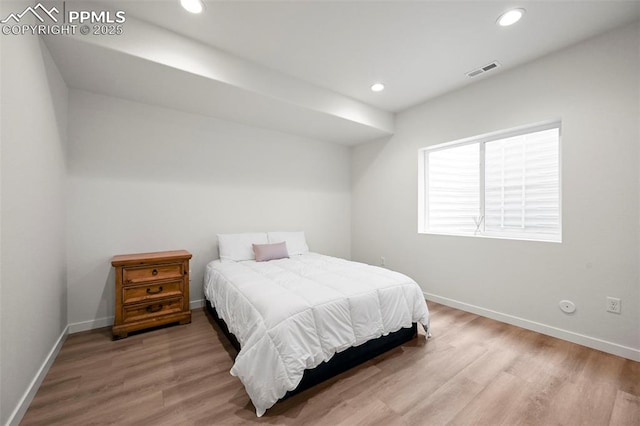 8309 Tom Ketchum Dr, Colorado Springs, CO 80908 - bedroom with wood finished floors and recessed lighting