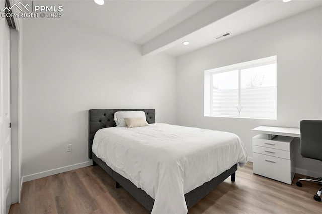 8309 Tom Ketchum Dr, Colorado Springs, CO 80908 - bedroom with recessed lighting, light wood-type flooring, and an office area