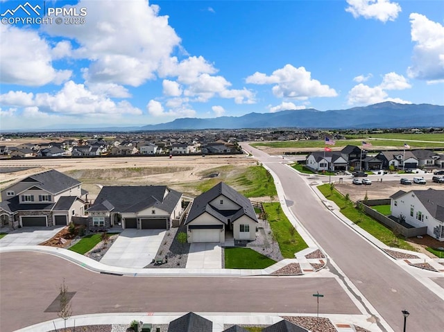 8309 Tom Ketchum Dr, Colorado Springs, CO 80908 - aerial view of residential area featuring a mountain backdrop
