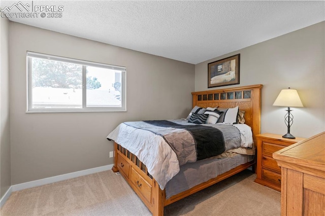 4742 Villa Cir Unit A, Colorado Springs, CO 80918 - bedroom featuring light carpet and a textured ceiling