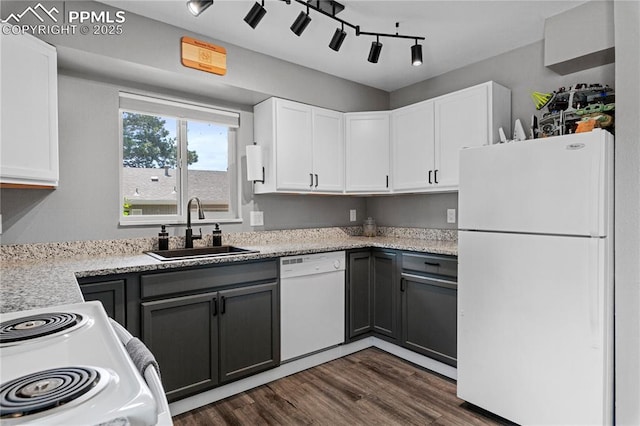 4742 Villa Cir Unit A, Colorado Springs, CO 80918 - kitchen with white appliances, white cabinets, dark wood-style floors, and track lighting